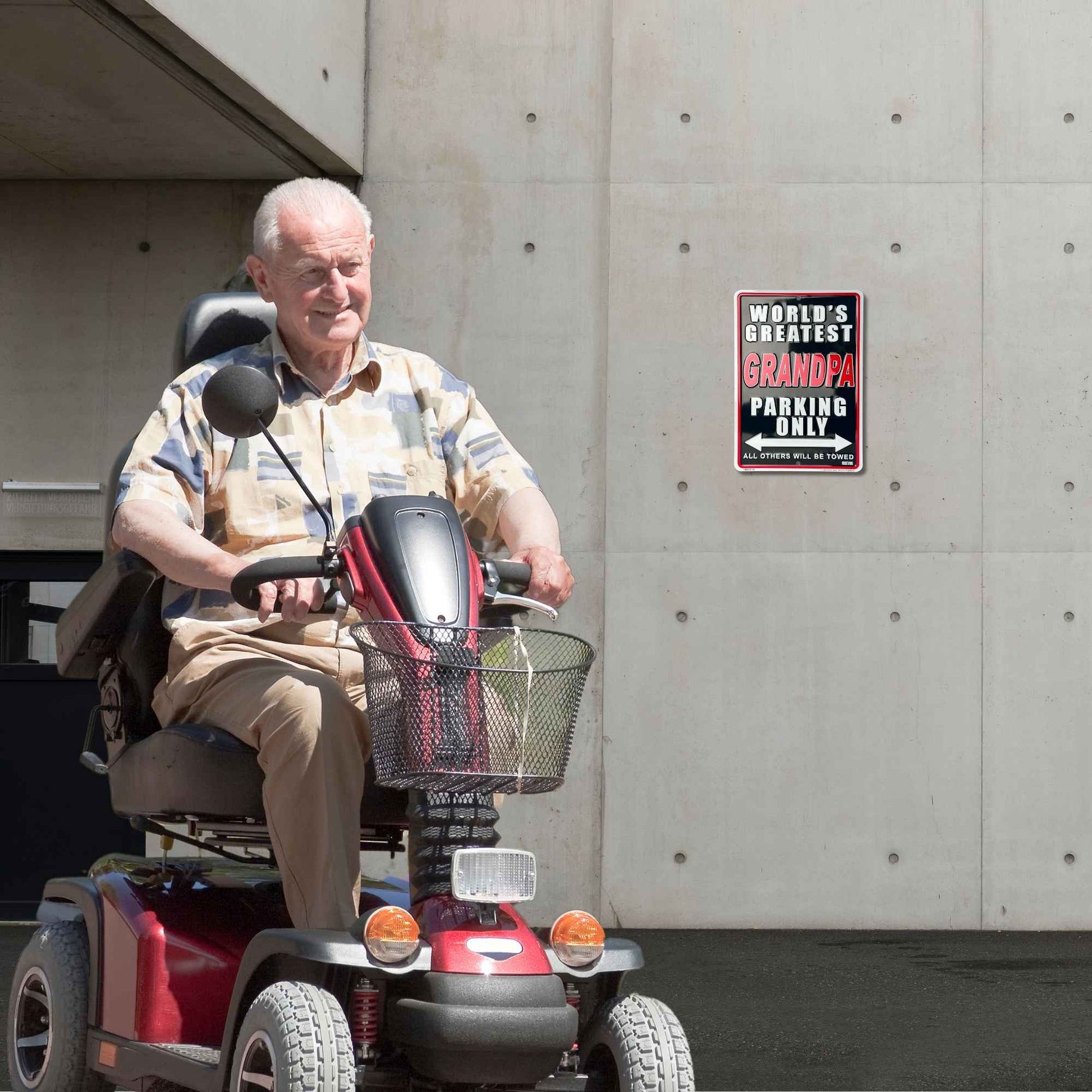 World's Greatest Grandpa parking only all others will be towed driving scooter