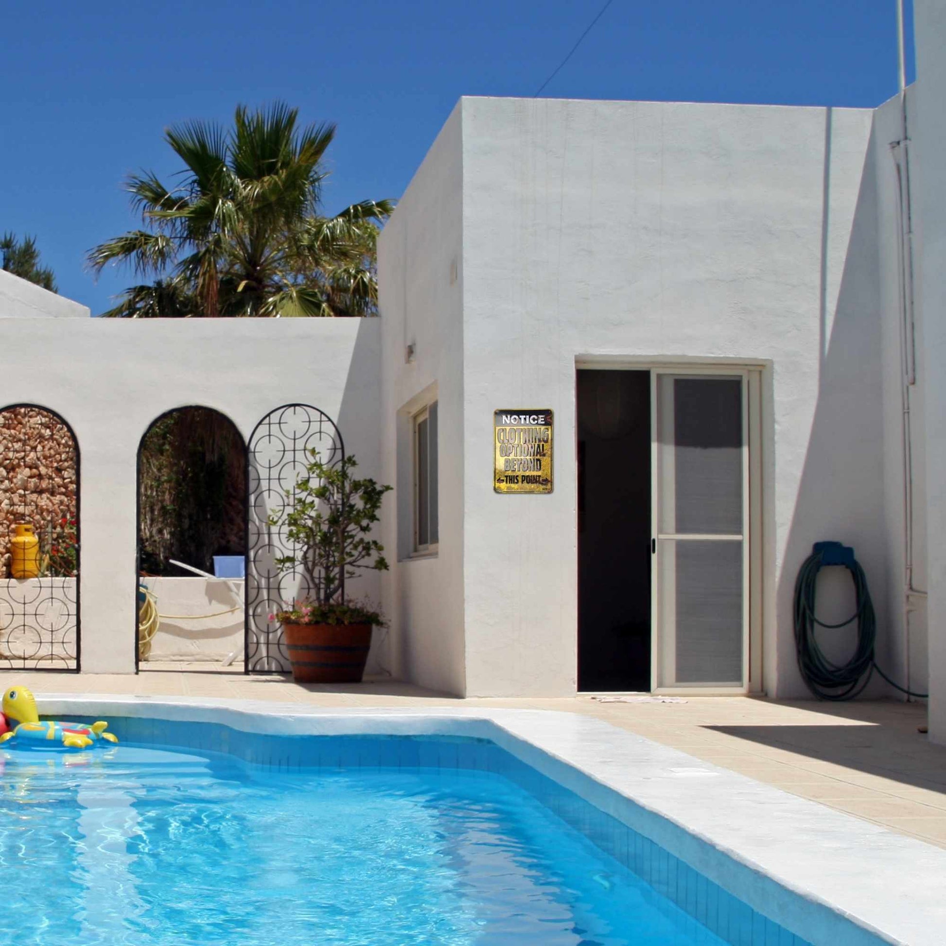 Notice Clothing Optional Beyond This Point By The Pool