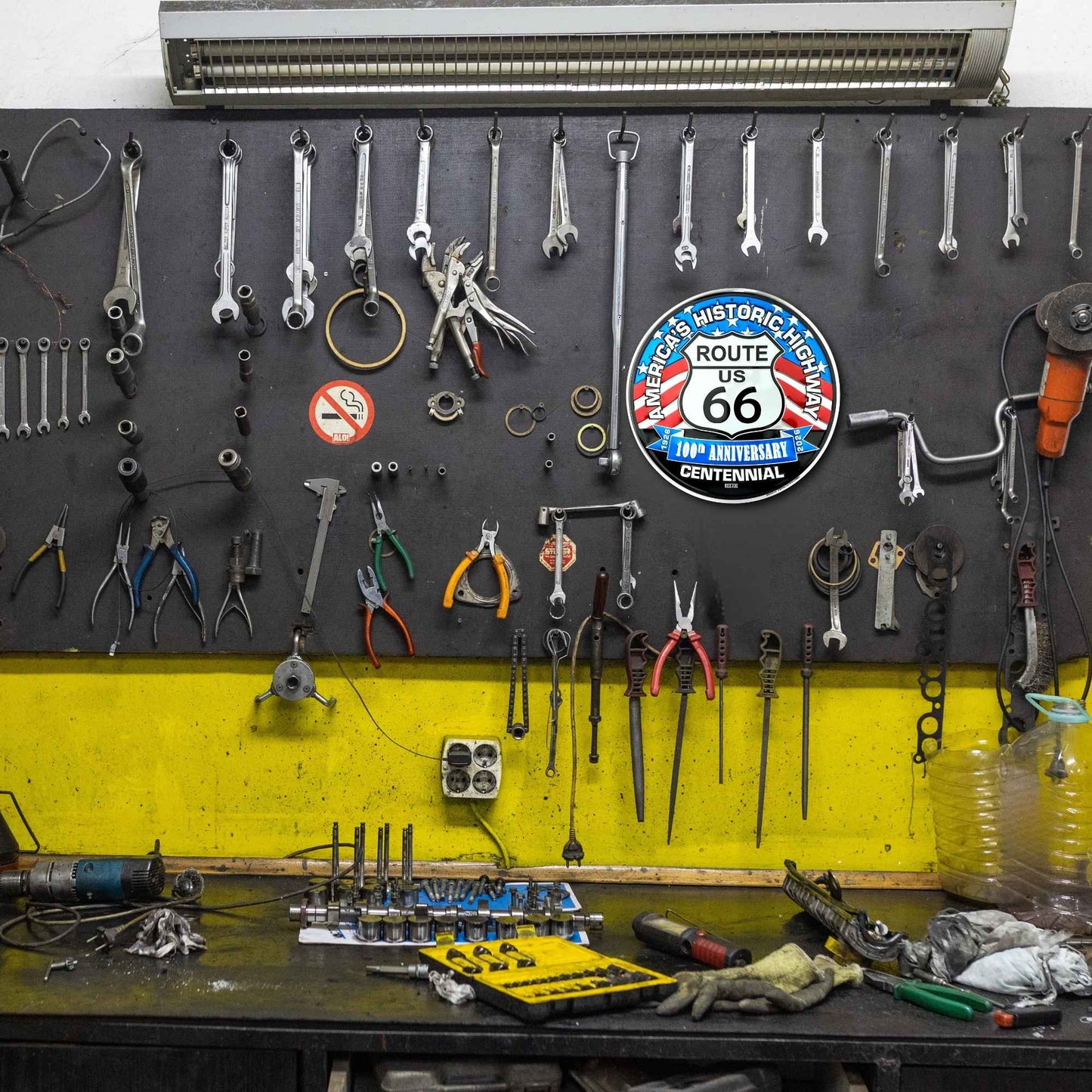 Workshop wall with tools and Route 66 sign